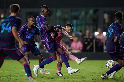 MLS, Inter Miami vs Charlotte FC: Inter Miami forward Lionel Messi, center, gets off a shot past the defense of Charlotte FC midfielder Djibril Diani