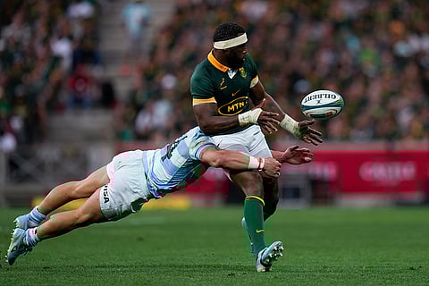 Rugby Championship: South Africa's captain Siya Kolisi, right, is tackled by Argentina's Rodrigo Isgro