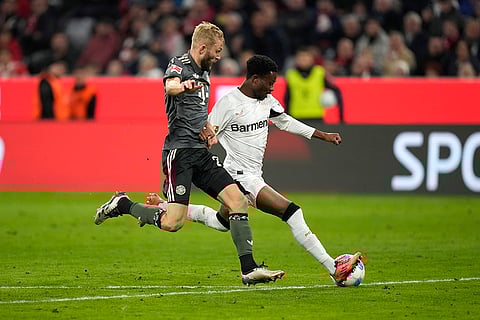 Bundesliga, Bayern Munich vs Leverkusen: Bayern's Konrad Laimer and Leverkusen's Amine Adli vie for the ball