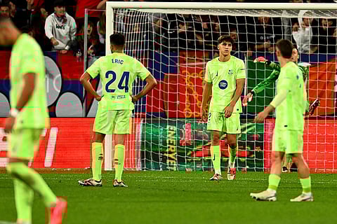 La Liga 2024-25, Osasuna and Barcelona: Barcelona players react as Osasuna's Ante Budimir celebrates his side's third goal