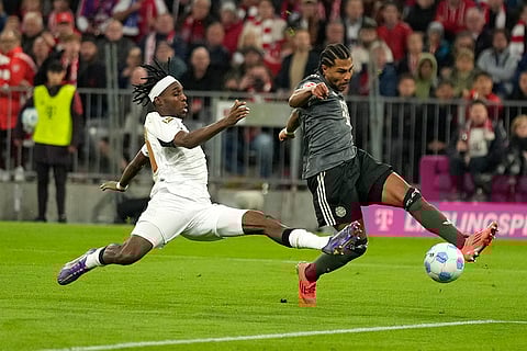 Bundesliga, Bayern Munich vs Leverkusen: Leverkusen's Jeremie Frimpong, left, and Bayern's Serge Gnabry vie for the ball