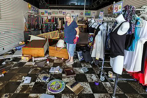 Hurricane Helene: Jill Rice looks over the damage to her store caused by flooding