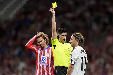 La Liga 2024-25 Atletico Madrid vs Real Madrid: Real Madrid's Luka Modric receives a yellow card