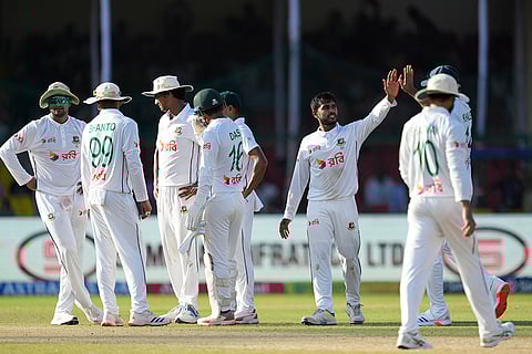 India vs Bangladesh 2nd Test Day 4: Bangladesh's Mehidy Hasan Miraz, second right, with teammates celebrate the wicket of India's Ravindra Jadeja