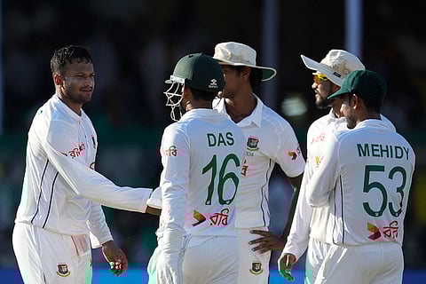 India vs Bangladesh 2nd Test Day 4: Bangladesh's Shakib Al Hasan, left, with teammates celebrates the wicket of India's Ravichandran Ashwin
