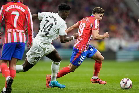La Liga 2024-25 Atletico Madrid vs Real Madrid: Atletico Madrid's Julian Alvarez in action in front of Real Madrid's Aurelien Tchouameni