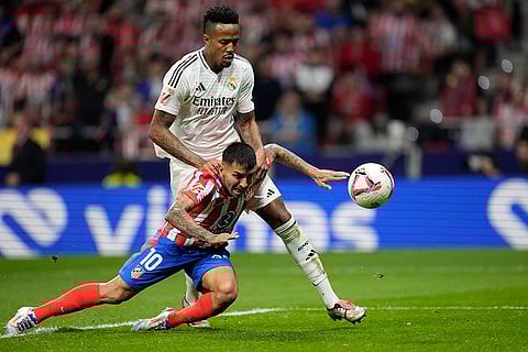La Liga 2024-25 Atletico Madrid vs Real Madrid: Atletico Madrid's Angel Correa scores in front of Real Madrid's Eder Militao