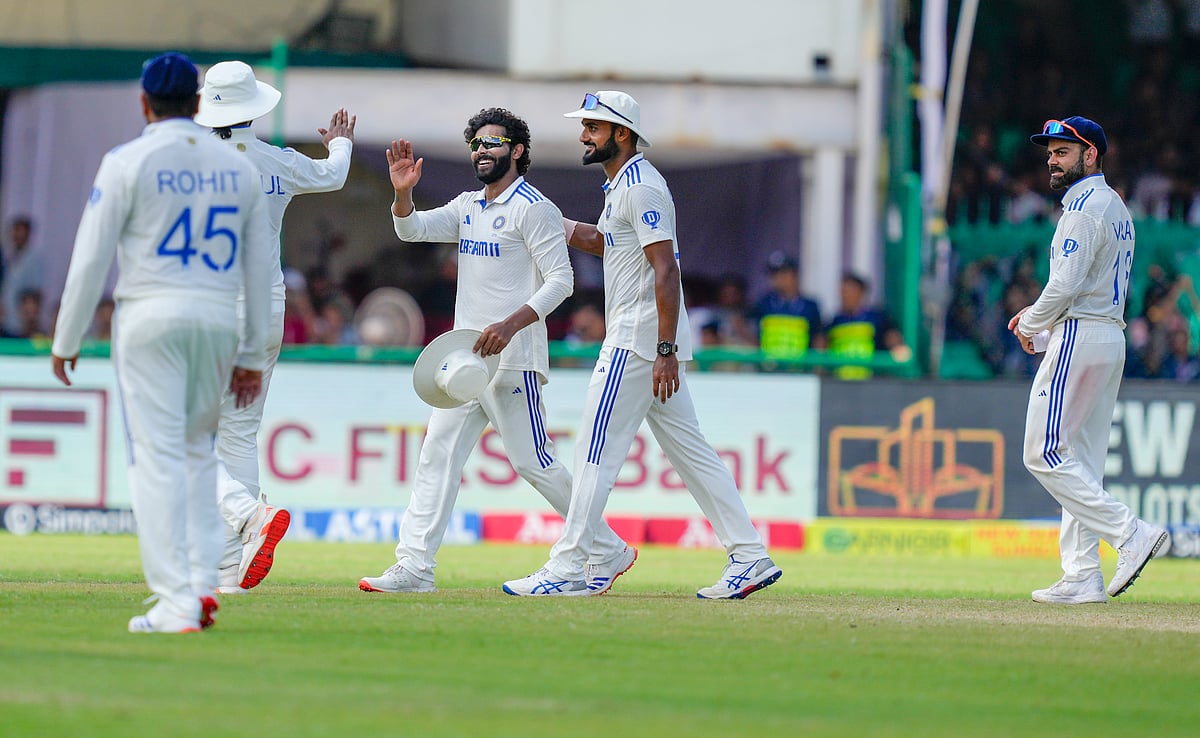  India's Ravindra Jadeja with teammates celebrates the wicket of Bangladeshi batter Khaled Ahmed during the fourth day of the 2nd Test cricket match between India and Bangladesh, at the Green Park stadium, Kanpur, Monday, Sept. 30, 2024 - PTI/Vijay Verma