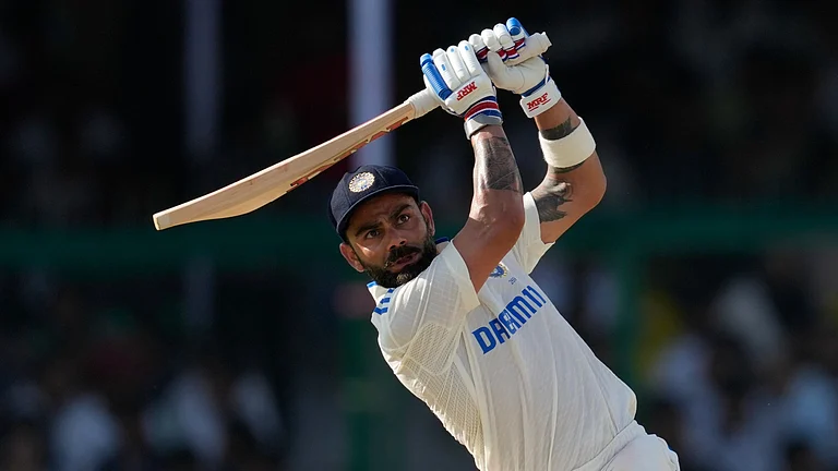 India's Virat Kohli plays a shot on the fourth day of the second cricket test match against Bangladesh - AP