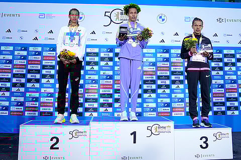 Berlin Marathon: Second placed Mestawot Fikir, winner Tigist Ketema and Bosena Mulatie attend the medal ceremony