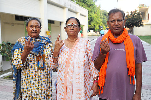 3rd phase of J&K polls: People from the Valmiki community show their fingers marked with indelible ink after casting their votes at Gandhi Nagar in Jammu