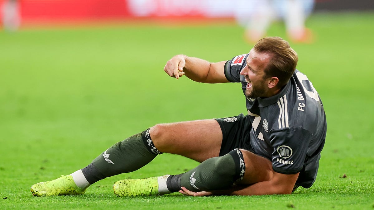 Kane was injured late on against Leverkusen - null