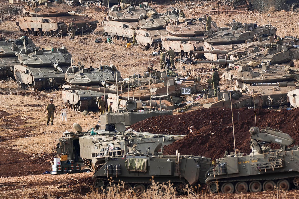 AP :  Israeli soldiers near the Israel-Lebanon border