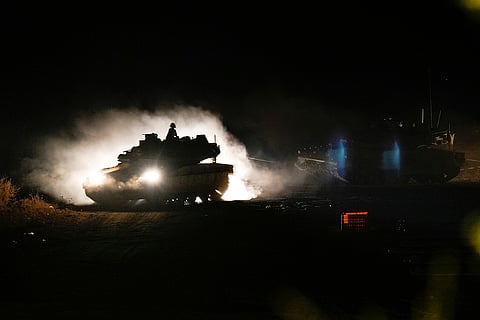 Mideast Tensions: An Israeli tank manoeuvres in northern Israel