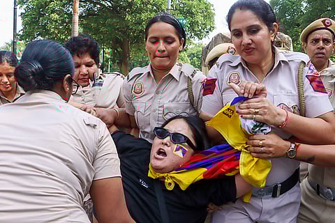 Tibetans protest in against China
