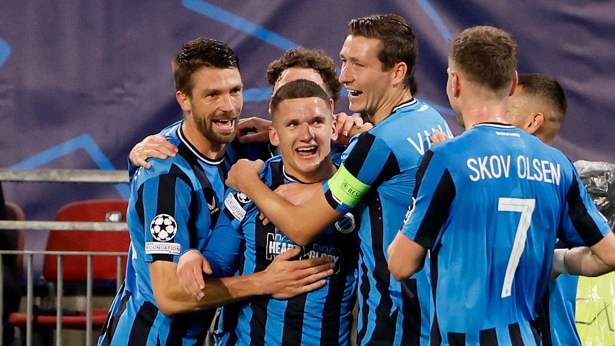 Brugge celebrate Tzolis' strike