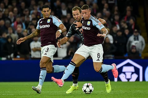 UCL 2024-25, Aston Villa vs Bayern Munich: Bayern's Harry Kane, center, duels for the ball with Aston Villa's Ross Barkley, right, and Aston Villa's Diego Carlos