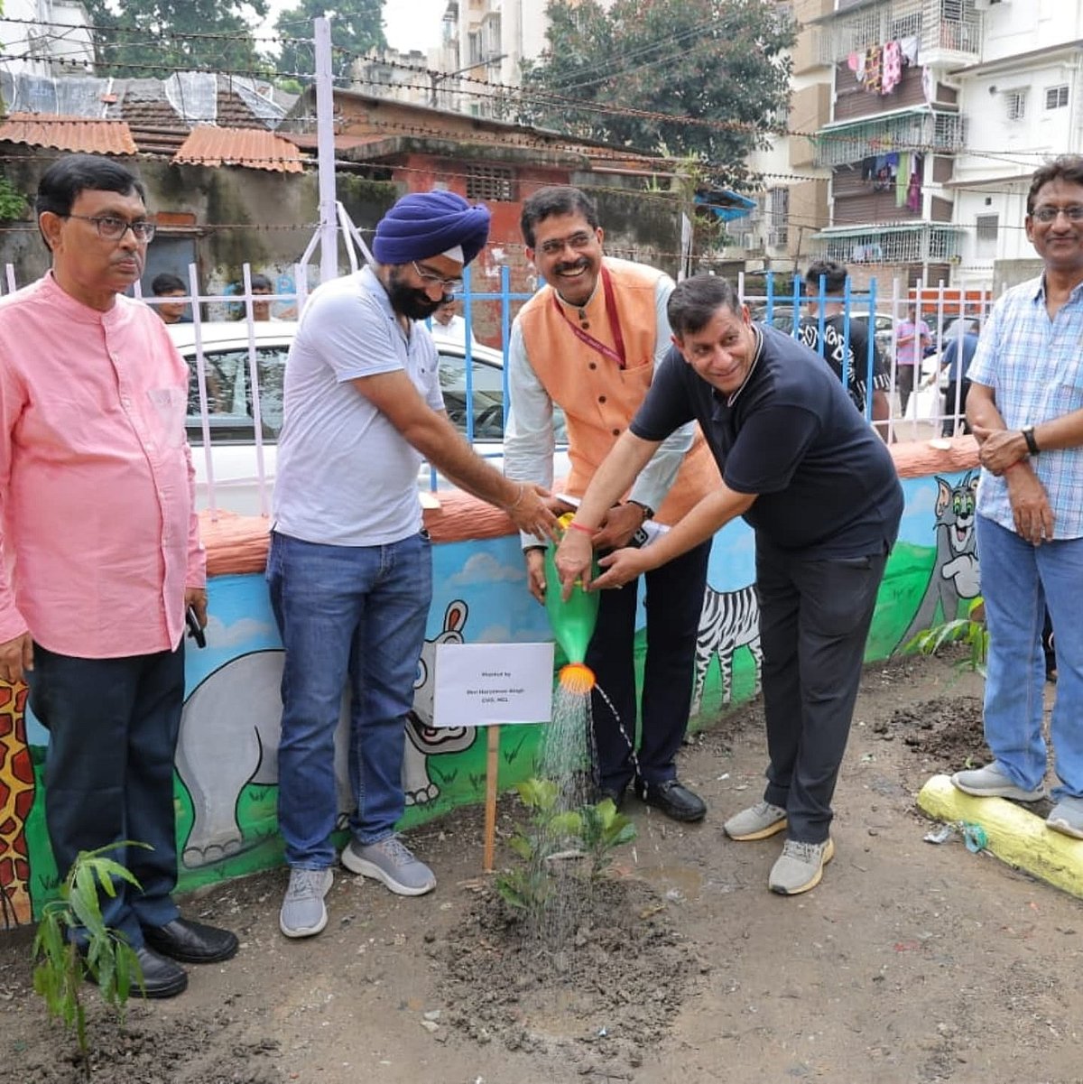 Shri Ghanshyam Sharma, CMD, HCL, Shri Sanjiv Kumar Singh, Director (Mining), HCL, Shri Harsimran Singh, CVO, HCL, planting saplings at the children's park