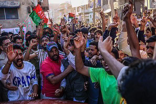 Getty Images : Supporters of Sheikh Abdul Rashid, also known as Engineer Rashid, at a public rally in Sopore, Jammu and Kashmir.