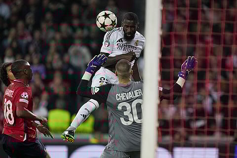 UCL 2024-25, Lille vs Real Madrid: Real Madrid's Antonio Rudiger, top, fails a chance to score