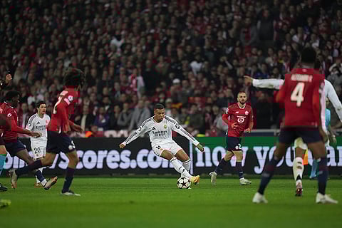 UCL 2024-25, Lille vs Real Madrid: Real Madrid's Kylian Mbappe, center dribbles the ball