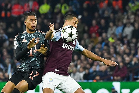 UCL 2024-25, Aston Villa vs Bayern Munich: Bayern's Michael Olise, left, duels for the ball with Aston Villa's Youri Tielemans