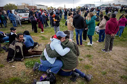 Solar eclipse 2024: People embrace during an annular solar eclipse in Puerto San Julian