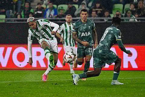 UEFA Europa League 2024-25, Ferencvaros vs Tottenham Hotspur: Ferencvaros' Matheus Saldanha, left, kicks the ball