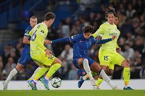 UEFA Europa Conference League 2024-25, Chelsea vs Gent: Chelsea's Joao Felix, center, is challenged by Gent's Mathias Delorge, left, and Atsuki Ito