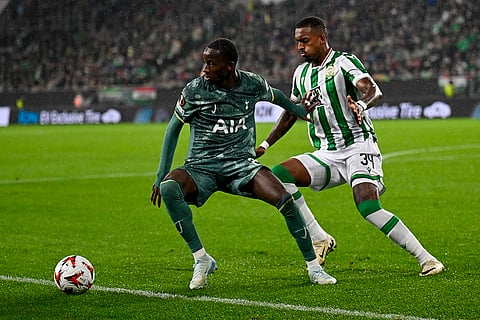 UEFA Europa League 2024-25, Ferencvaros vs Tottenham Hotspur: Tottenham's Pape Matar Sarr, left, is challenged by Ferencvaros' Raul Gustavo