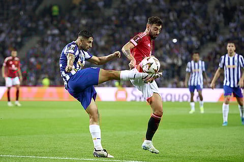 UEFA Europa League 2024-25, FC Porto vs Manchester United: Manchester United's Bruno Fernandes vies for the ball with Porto's Alan Varela