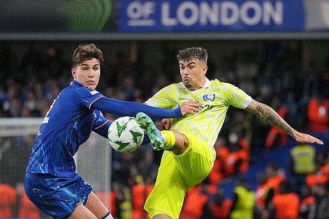 UEFA Europa Conference League 2024-25, Chelsea vs Gent: Gent's Tiago Araujo is challenged by Chelsea's Cesare Casadei