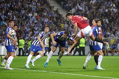 UEFA Europa League 2024-25, FC Porto vs Manchester United: Manchester United's Harry Maguire, foreground right, scores his side's third goal