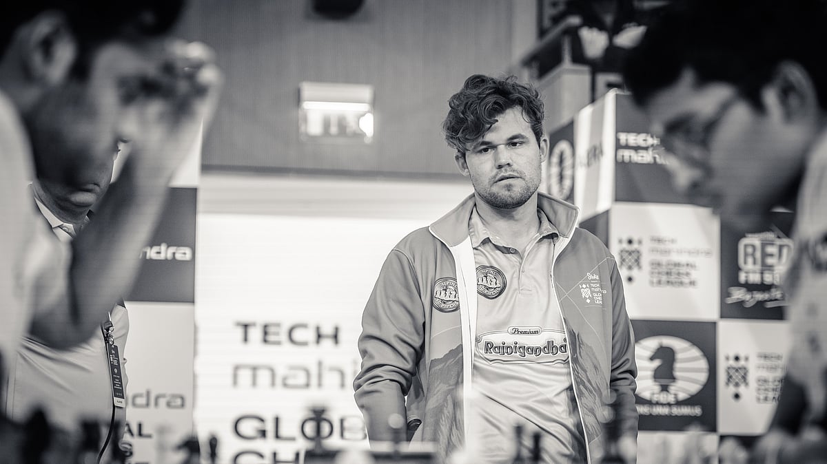 Special Arrangement : Magnus Carlsen (centre) watches Arjun Erigaisi (left) and R Praggnanandhaa intently during the Global Chess League in London.