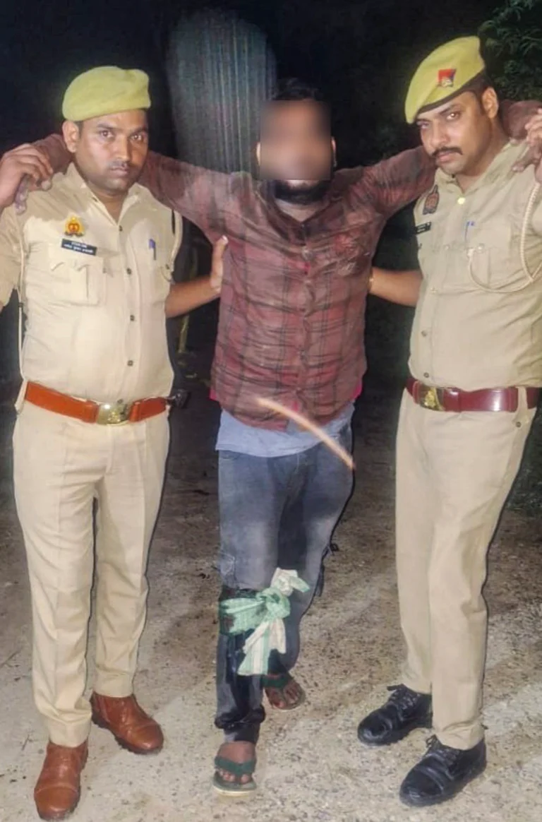 Police take away Chandan Verma after he sustained injuries on his right leg following an encounter with the police early Saturday morning, Oct. 5, 2024. - PTI
