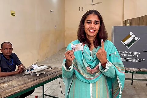Haryana Assembly elections: Former wrestler and BJP leader Babita Phogat shows her inked finger after casting her vote