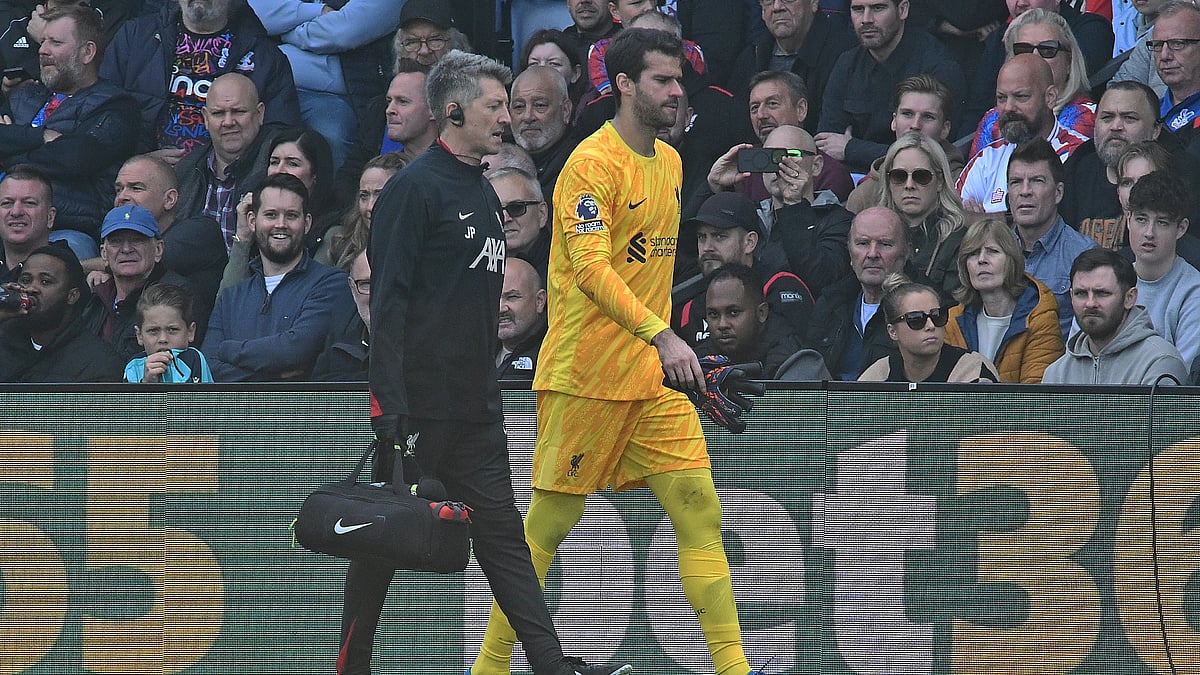 Liverpool goalkeeper Alisson was forced off injured against Crystal Palace - null