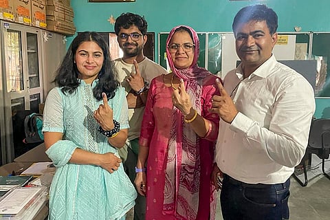 Haryana Assembly elections: Paris Olympics medallist shooter Manu Bhaker and her family members show their fingers marked with indelible ink after casting vote