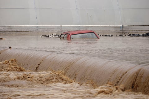 Bosnia Floods: A car is submerged in flood waters in the village of Kiseljak