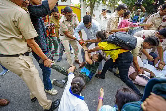 Delhi: High Drama Unfolds As AAP Leaders Lay On Feet Of BJP MLAs Over Bus Marshal Issue | Details