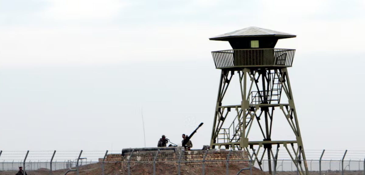 Iranian soldiers stand guard inside the Natanz uranium enrichment facility. - Reuters