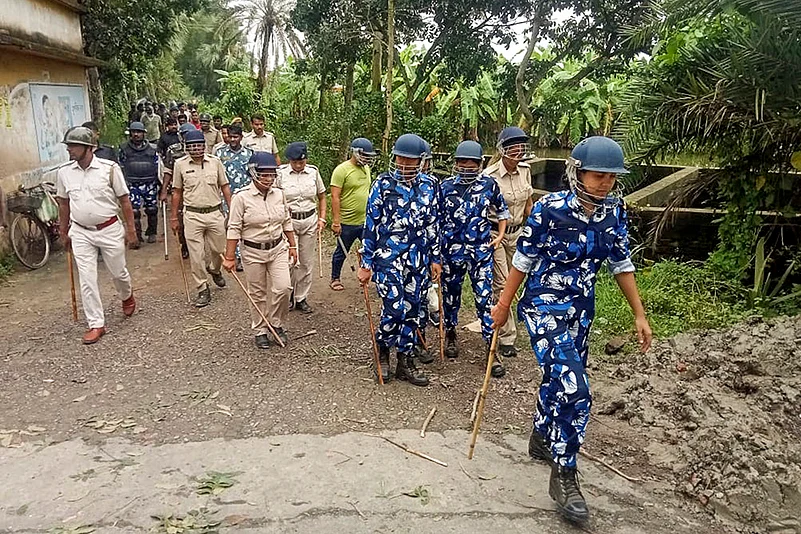 RAF and police personnel arrive after protest over rape and murder incident in South 24 Parganas