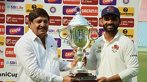 Photo: X | Mumbai Cricket Association : Mumbai captain Ajinkya Rahane lifts the Irani Cup trophy.