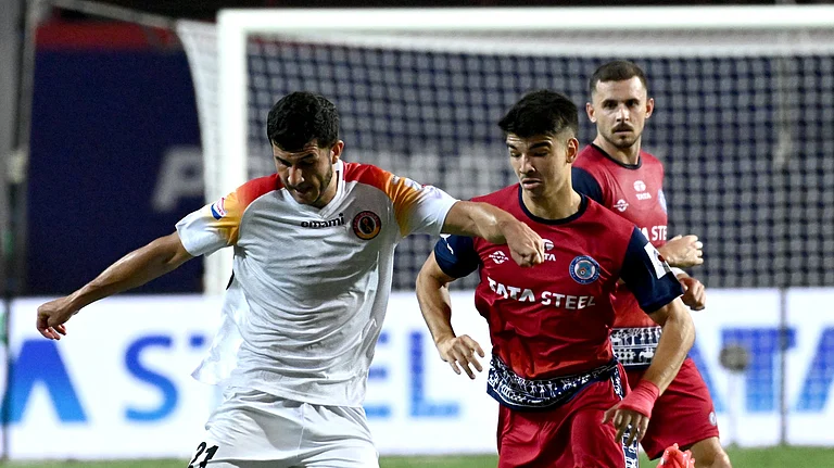 Jamshedpur FC players trying to tackle East Bengal FC during an ISL match. - Photo: X | Indian Super League