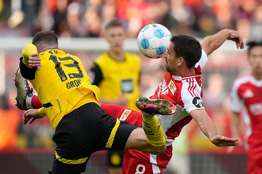 Photo: AP/Ebrahim Noroozi : Union Berlin vs Borussia Dortmund