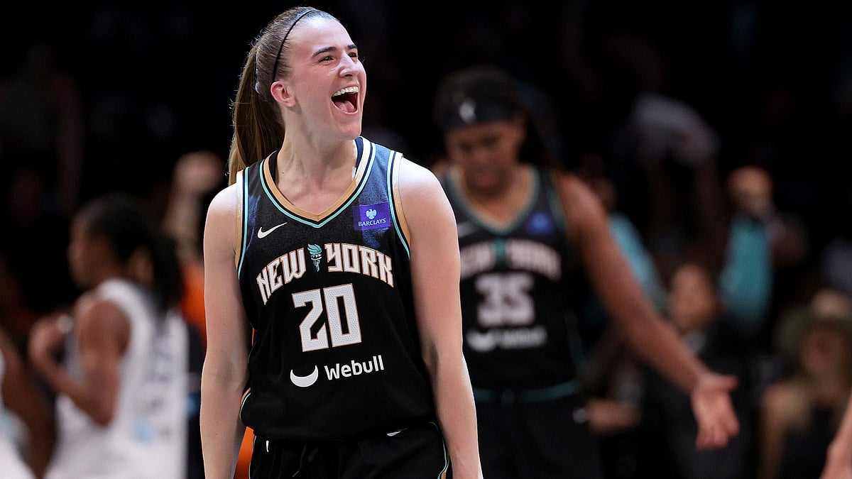 Sabrina Ionescu of the New York Liberty celebrates. - null