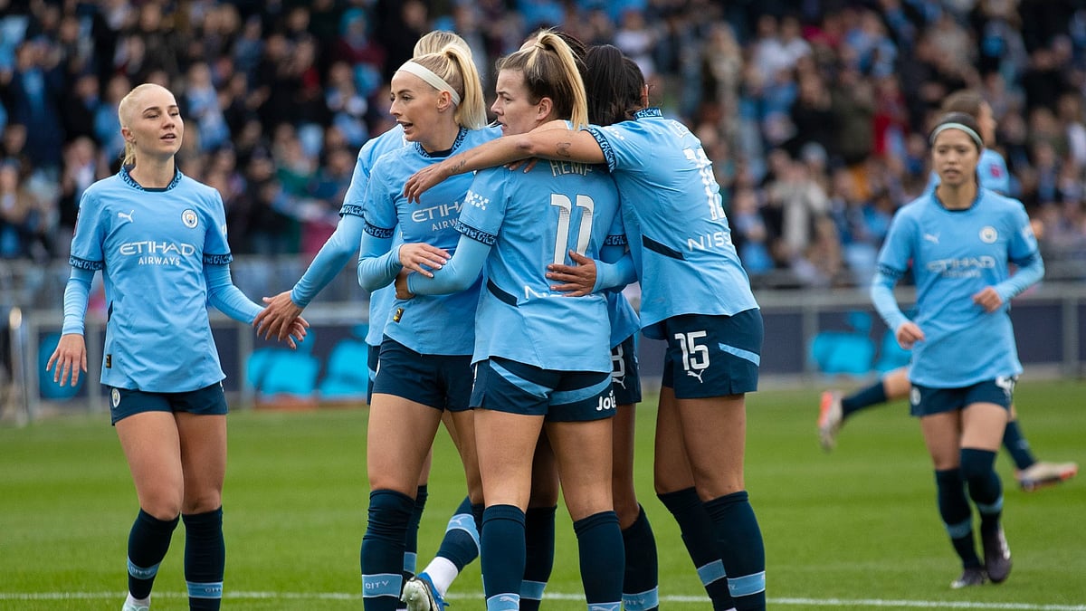 Lauren Hemp celebrates her opener