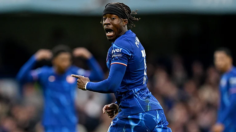 Noni Madueke celebrates after scoring the equaliser for Chelsea - null