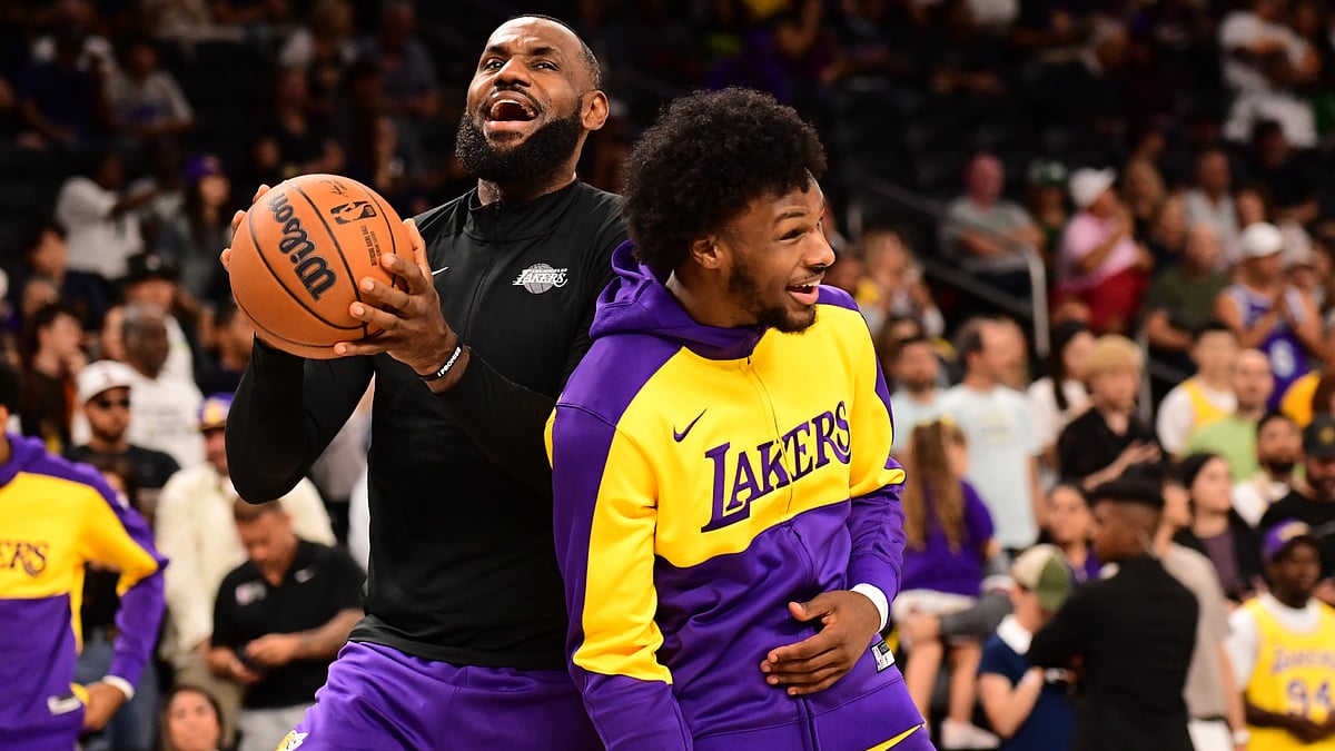LeBron James and Bronny James pictured during Sunday's pre-game warmup