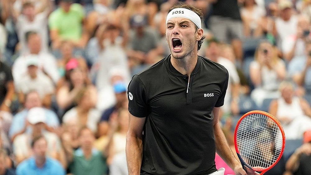 Photo: AP/Eduardo Munoz Alvarez : Taylor Fritz, of the United States